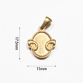 Macro detail of vintage gold-plated oval heart pendant with embossed scroll motifs - Scroll Motif Oval (BAD090)