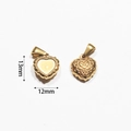 Detail of 13mm gold heart pendant showing embossed vine patterns and beaded edges - Vine Relief Heart (BAD093)