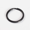 Detailed macro view of a flat black 304 stainless steel key ring with double-layered spiral - 1.5mm Wire * 15mm OD / Black