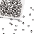 Macro detail of silver stainless steel beads with through-holes for DIY jewelry making - OD 2mm*ID 1mm / Stainless Steel Silver
