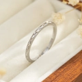 Macro shot of silver titanium steel ring with diamond star pattern in a jewelry box - Star Faceted Style (R040) / Size 5 / Silver