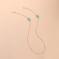 Golden chain eyewear strap with light blue turquoise beads and silicone anti-slip ends - Gold