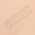 Detail of gold chain with white frosted beads and silicone loops for eyeglasses - Gold White Beads