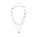 Double-layered gold starfish necklace with colorful daisy charms and adjustable chain - Gold