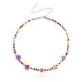 Colorful beaded necklace featuring lemon and watermelon clay fruit charms with silver clasp - Colorful