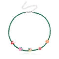 Green beaded necklace featuring colorful fruit charms like lemon, watermelon, and strawberry - Green
