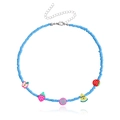 Blue beaded necklace with colorful fruit charms featuring apple strawberry and watermelon - Blue