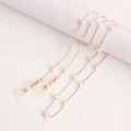 Detalle de cadena dorada para gafas con perlas de corazón y lazos de silicona - Estilo Colgante Corazón (1#)