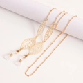 Chaîne de lunettes dorée avec breloques feuilles ajourées et boucles en silicone - Pendentif Feuille