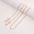 Elegante catenella per occhiali dorata con chiusure a moschettone e passanti in silicone - Catena a Croce Dorata (4#)