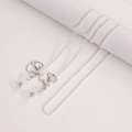 Silver eyewear chain with heart pendants and silicone loops on minimalist background - Silver