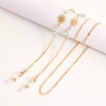 Détail de la chaîne de lunettes dorée avec motifs de soleil et perles givrées irisées - Style Charme Soleil (6#)