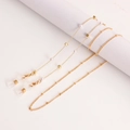 Gouden brillenkoord met witte imitatieparels en goudkleurige kralen en siliconen lussen - Vierkante Parel Stijl (9#)