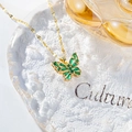 Exquisite butterfly necklace with emerald green zircon pendant in a gold setting for women - Peacock Green
