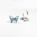 Detailed macro view showing the blue crystal butterfly rings with fine silver finish - Open Adjustable / Light Blue