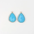 Detail of tear-drop blue glass pendants with gold-plated edges for DIY jewelry making - Sky Blue