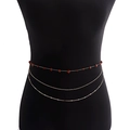 Catena in vita multistrato dorata bohémien con pietre rosse su manichino nero - Stile Pietra Rossa / Rosso