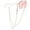 Lunettes de soleil géométriques à verres roses et chaîne dorée avec papillons en émail coloré - Style Papillon Coloré (ZW744)