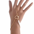 Golden punk heart finger bracelet with white imitation pearls on model hand - Heart Connect With Pearl (ZW2945-4#)
