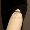 Detail view of silver heart leg chain and black lace garter with butterfly pendant - Heart & Butterfly Lace Style (Steel Color)