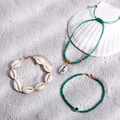 Three-piece bohemian beach anklet set featuring natural shells and evil eye charms - Green