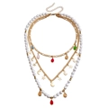 Collana bohémien a più strati con perline colorate e ciondoli dorati su sfondo bianco - Collana con Stelle Lune e Perle a 4 Strati (ZW385)