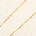Macro view of a delicate gold-plated stainless steel lip chain with round links - Gold Cable Chain