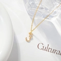 Elegant gold letter J necklace with a zircon-inlaid flower pendant for women - Letter J