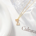 Minimalist gold necklace featuring letter Z pendant with micro-inlaid cubic zirconia stone - Letter Z