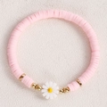 Pink handmade Heishi clay bead bracelet featuring a white daisy charm and gold accents - Flesh Pink