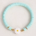 Handmade light blue heishi bead bracelet featuring a delicate white daisy charm - Mint Green