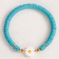 Sky blue polymer clay bead bracelet with a white daisy charm and golden spacers - Sky Blue