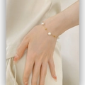 Elegant gold titanium bracelet with three white pearls and delicate golden beads - Artificial Pearl and Gold Bead Bracelet (5512) / Gold