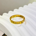 Golden titanium steel ring with black Roman numerals and a small zircon stone - US 5 / Gold
