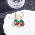 Macro detail of pear-cut tourmaline earrings with pavé setting and gradient color - 5# (Green Red Gradient)