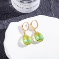 Detailed macro view of gold drop earrings with micro-set zircons and green pear stones - 6# (Green Yellow Gradient)