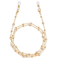 Golden eyewear chain with crescent charms and white faux pearls on white background - Gold