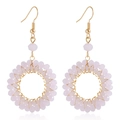 Fashionable golden braided hoop earrings with light pink crystals and boho style hooks - Pink