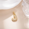 Macro detail of gold-plated hip hop letter J pendant with micro-pave cubic zirconia - Letter J (BGQZM003)