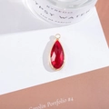 Macro view of teardrop red crystal pendant with gold plating for jewelry making - Outer Size 11x25mm / Red