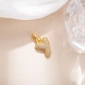 Macro shot of gold-plated letter Y pendant with pavé cubic zirconia on cream leather - Letter Y (BGQZM003)