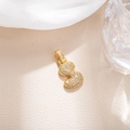 Macro shot of gold-plated number 3 pendant with sparkling pave cubic zirconia - Letter S (BGQZM003)