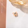 Macro shot of a mini apricot butterfly hair claw clip with a sparkling crystal center stone - Rose Red Base White Butterfly