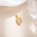 Macro shot of gold-plated letter F pendant with micro-pave cubic zirconia on leather - Letter F (BGQZM003)