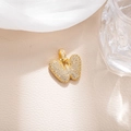 Detailed macro view of heart-shaped gold pendant with micro-paved zircons and large bail - Letter W (BGQZM003)