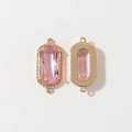 Dettaglio del connettore ovale placcato oro con cristallo rosa per creazione di gioielli - Rosa