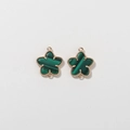Detailed view of two gold beaded star pendants with green malachite texture inserts - Green