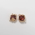 Detail of vintage square silk scarf buckle with red garnet stone and gold lotus motif - Dark Brown