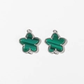 Macro detail of malachite-style star pendants with textured silver-plated edges - Green