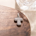 Macro shot of silver capital letter T pendant with pavé cubic zirconia setting - Letter T